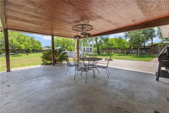 view of patio / terrace with a fenced backyard and outdoor dining area