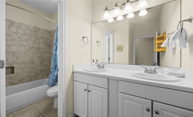 full bathroom featuring toilet, shower / bath combo, vanity, and tile patterned floors