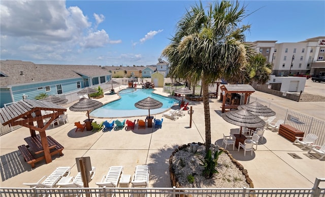 view of swimming pool with a patio