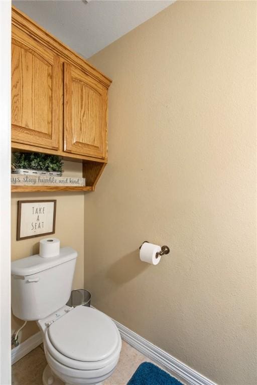 6814 Boardwalk Ave, Corpus Christi, TX 78414 - bathroom with toilet and baseboards