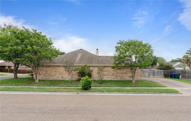 6814 Boardwalk Ave, Corpus Christi, TX 78414 - view of property exterior featuring driveway and fence