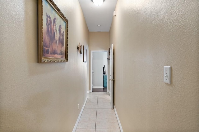6814 Boardwalk Ave, Corpus Christi, TX 78414 - hallway featuring baseboards and light tile patterned floors