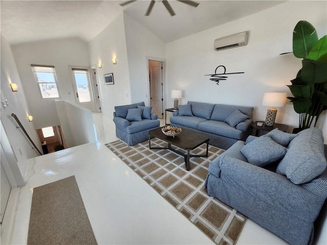 living area with high vaulted ceiling and an AC wall unit