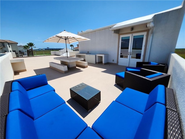 view of patio / terrace featuring french doors and outdoor lounge area