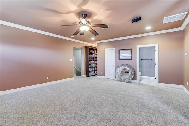 unfurnished living room with light colored carpet, baseboards, visible vents, and ornamental molding