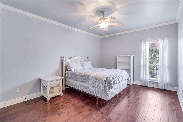 bedroom with ceiling fan, dark wood-type flooring, baseboards, and ornamental molding