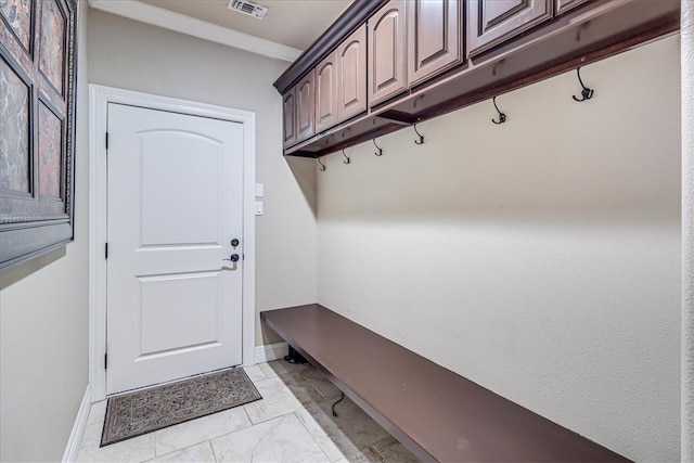 mudroom with visible vents, marble finish floor, and baseboards