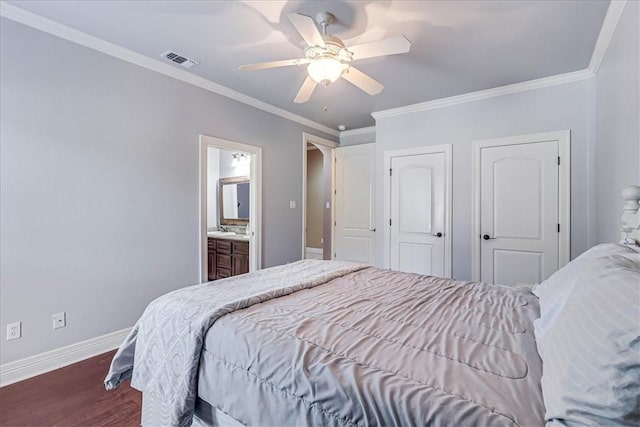 bedroom with visible vents, ornamental molding, dark wood-style floors, baseboards, and ceiling fan