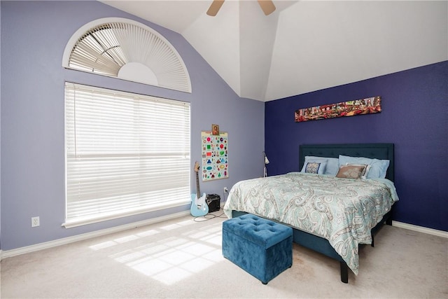 bedroom with carpet floors, vaulted ceiling, baseboards, and a ceiling fan