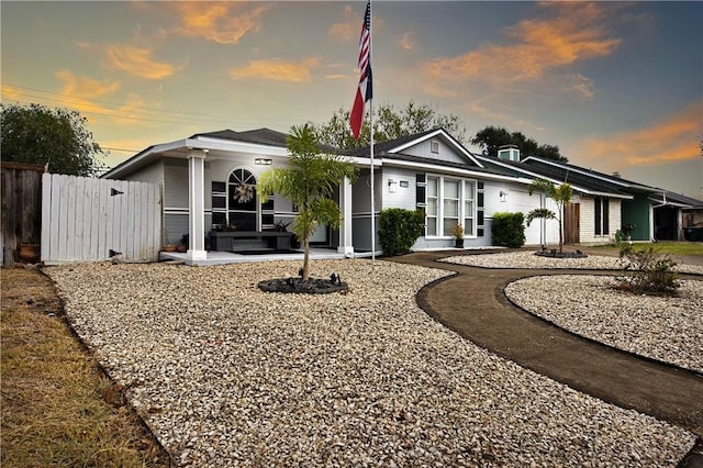 view of front of home featuring covered porch