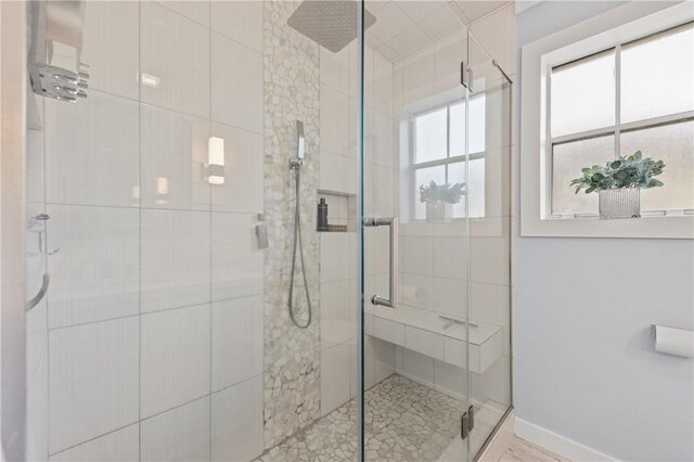 bathroom with an enclosed shower