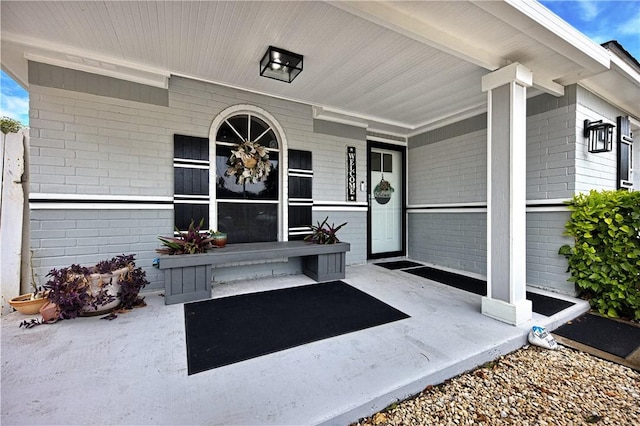 property entrance with a porch