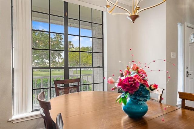 4442 Lake Superior Dr, Corpus Christi, TX 78413 - dining room with healthy amount of natural light and a chandelier