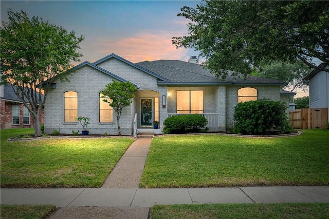 4442 Lake Superior Dr, Corpus Christi, TX 78413 - view of front of house featuring brick siding and a shingled roof