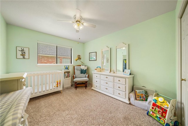 4442 Lake Superior Dr, Corpus Christi, TX 78413 - bedroom featuring carpet flooring, a nursery area, and a ceiling fan