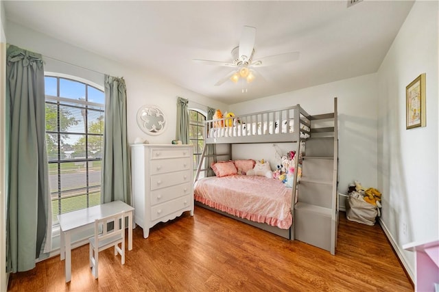 4442 Lake Superior Dr, Corpus Christi, TX 78413 - bedroom featuring multiple windows, wood finished floors, and ceiling fan