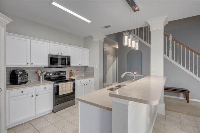 6517 Macarena Dr, Corpus Christi, TX 78414 - kitchen featuring tasteful backsplash, a sink, light tile patterned floors, stainless steel appliances, and visible vents