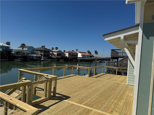 13741 Tajamar St, Corpus Christi, TX 78418 - dock area with a deck with water view and a residential view