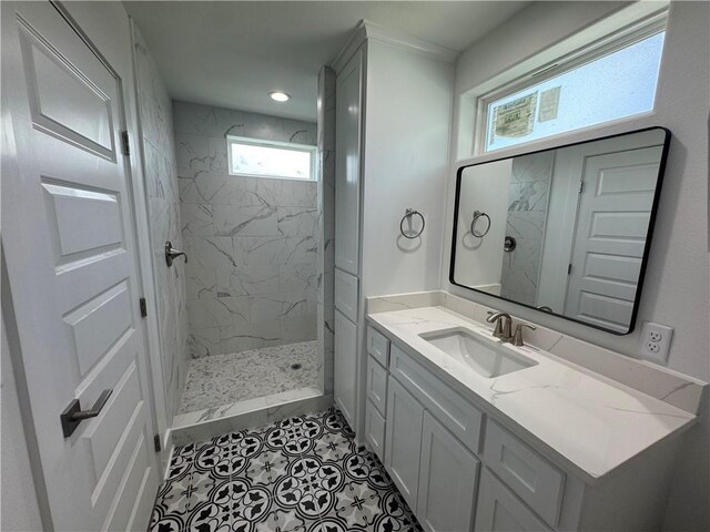 13741 Tajamar St, Corpus Christi, TX 78418 - full bath featuring a marble finish shower, vanity, and tile patterned floors
