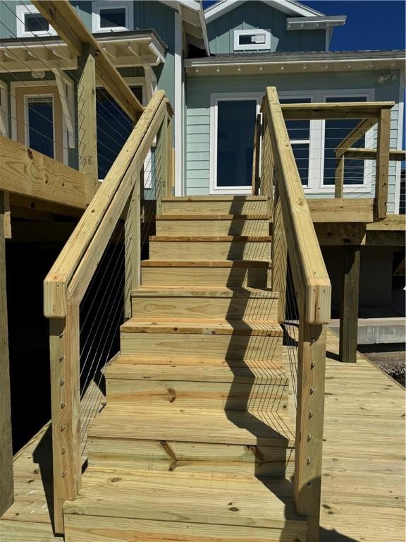 entrance to property featuring board and batten siding