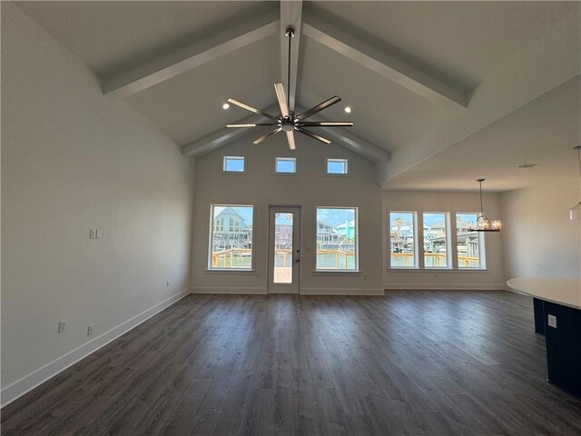13741 Tajamar St, Corpus Christi, TX 78418 - unfurnished living room featuring beamed ceiling, a chandelier, healthy amount of natural light, dark wood-style flooring, and high vaulted ceiling