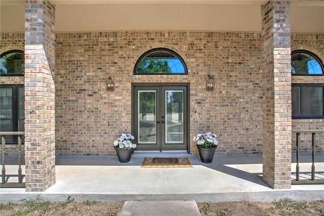 4102 Castle Valley Dr, Corpus Christi, TX 78410 - property entrance featuring french doors and brick siding