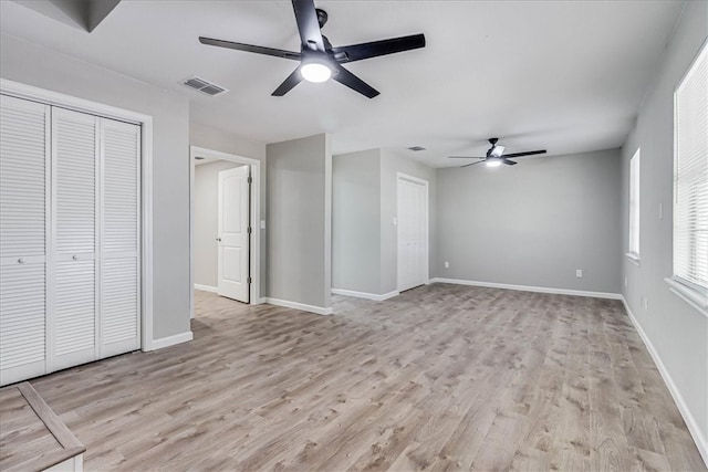 interior space featuring ceiling fan and light hardwood / wood-style flooring