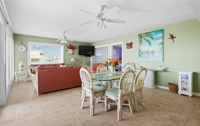 dining area featuring ceiling fan