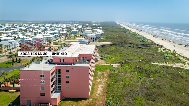 drone / aerial view with a view of the beach and a water view