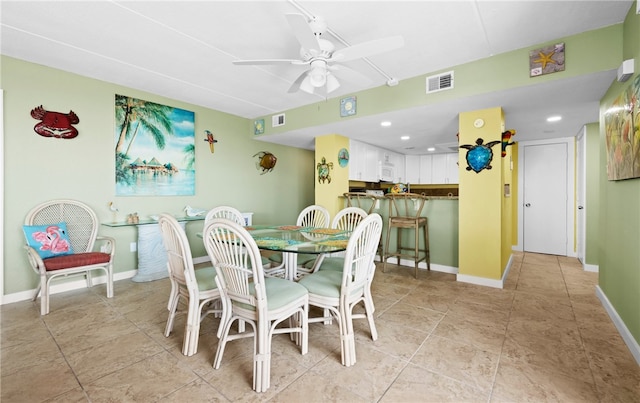 dining area with ceiling fan