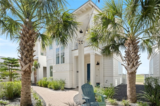 exterior space featuring decorative driveway