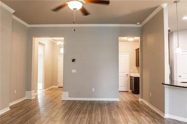 1020 Pasadena St, Portland, TX 78374 - unfurnished room featuring ceiling fan, light wood-style flooring, ornamental molding, and baseboards