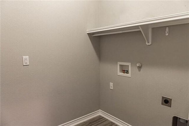 1020 Pasadena St, Portland, TX 78374 - laundry area with electric dryer hookup, hookup for a washing machine, baseboards, gas dryer hookup, and dark wood-style flooring