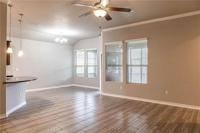 1020 Pasadena St, Portland, TX 78374 - unfurnished living room featuring wood finished floors, a ceiling fan, baseboards, a chandelier, and lofted ceiling