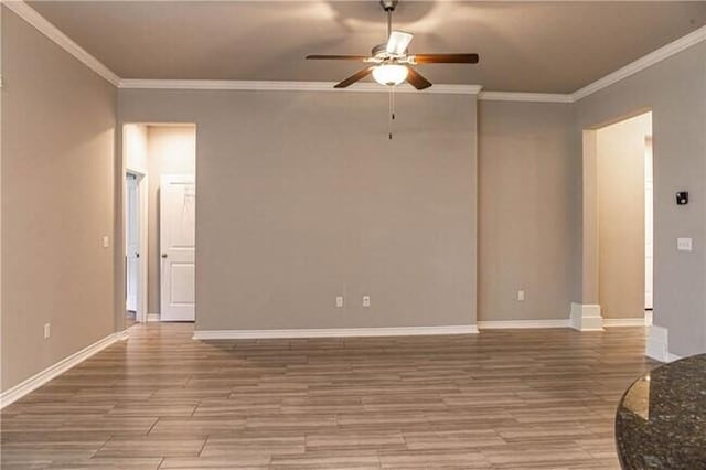 1020 Pasadena St, Portland, TX 78374 - spare room featuring ceiling fan, ornamental molding, wood finished floors, and baseboards