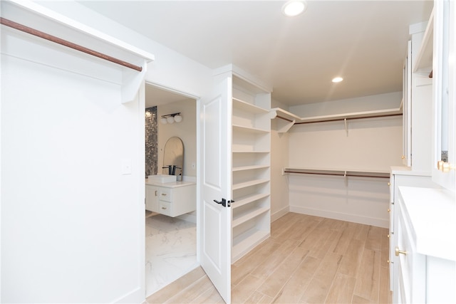 spacious closet with light wood-type flooring