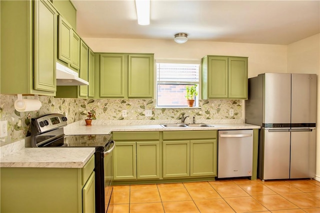 2821 Quebec Dr, Corpus Christi, TX 78414 - kitchen featuring green cabinetry, stainless steel appliances, under cabinet range hood, and a sink