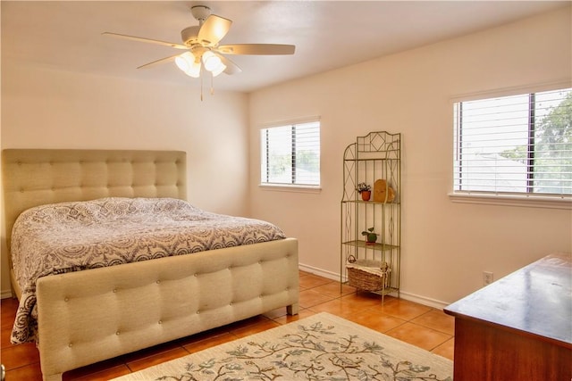 2821 Quebec Dr, Corpus Christi, TX 78414 - bedroom with light tile patterned flooring, baseboards, and a ceiling fan