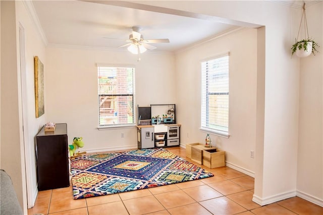2821 Quebec Dr, Corpus Christi, TX 78414 - home office with ceiling fan, crown molding, light tile patterned floors, and baseboards