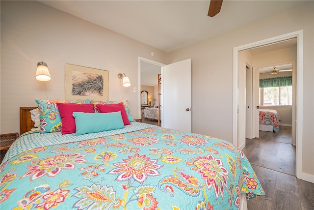 bedroom featuring wood-type flooring and ceiling fan