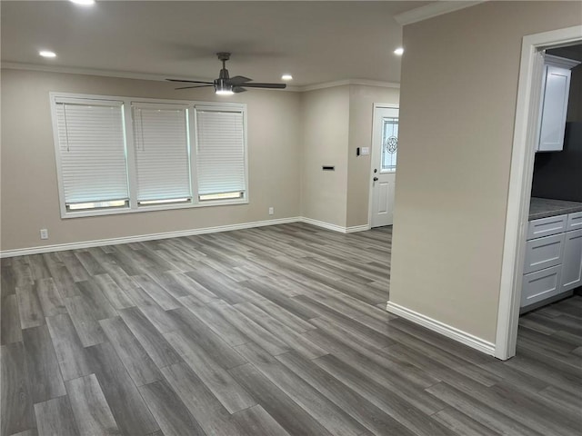 306 Circle Dr, Corpus Christi, TX 78412 - unfurnished room with ornamental molding, ceiling fan, dark wood-type flooring, baseboards, and recessed lighting