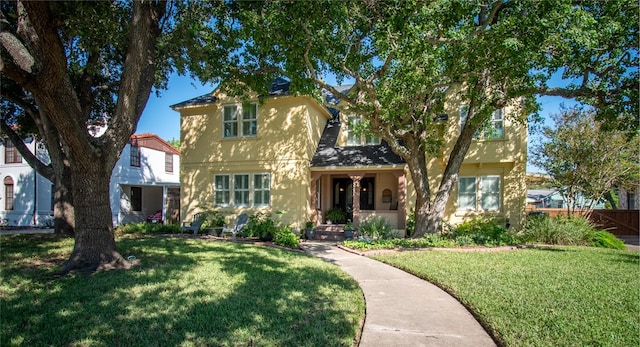 view of front of house with a front lawn