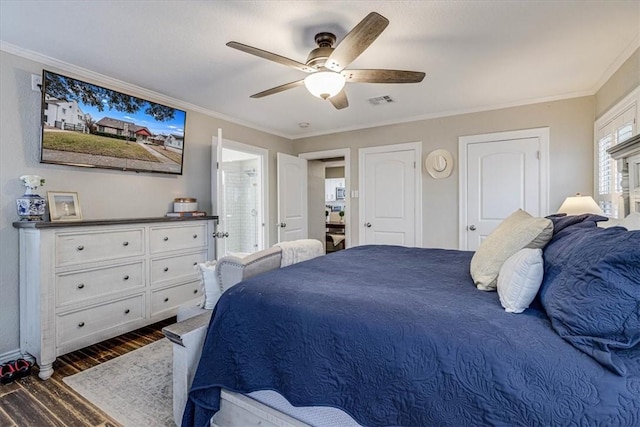 bedroom with ensuite bath, ornamental molding, dark hardwood / wood-style floors, and ceiling fan