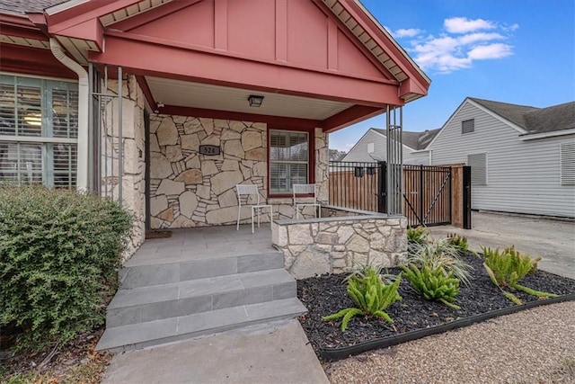 doorway to property featuring a porch