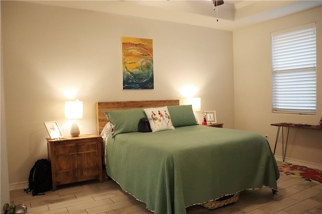 bedroom featuring ceiling fan and light wood-type flooring