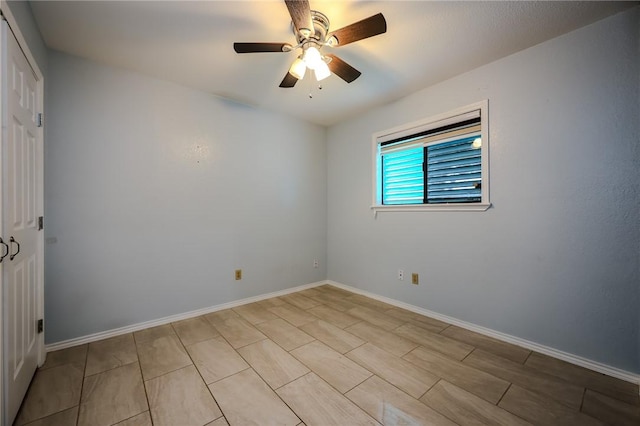 spare room featuring ceiling fan