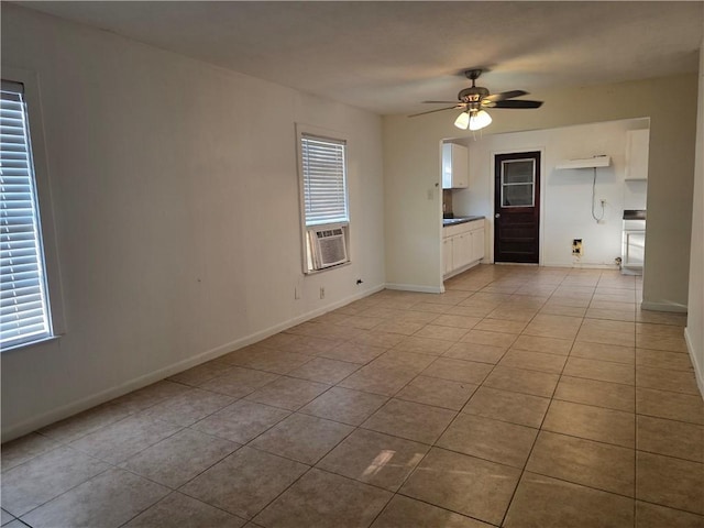 4513 Carroll, Corpus Christi, TX 78415 - kitchen with white appliances, under cabinet range hood, a sink, dark countertops, and white cabinetry