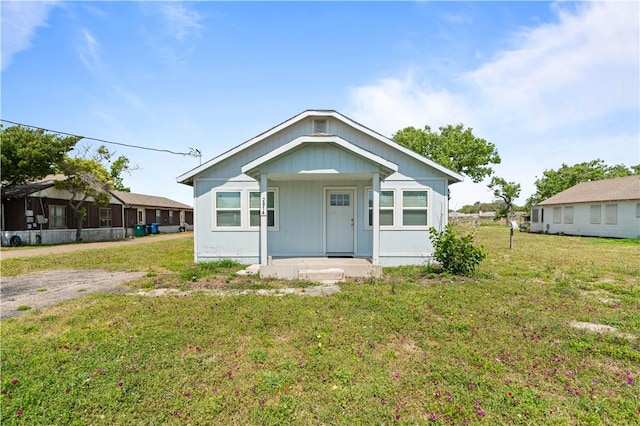 2914 Debra, Corpus Christi, TX 78418 - bungalow featuring covered porch and a front lawn