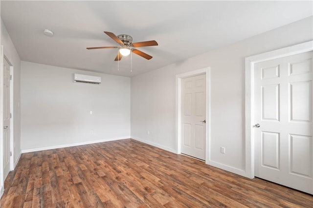 2914 Debra, Corpus Christi, TX 78418 - unfurnished bedroom featuring wood finished floors, a wall mounted air conditioner, and baseboards