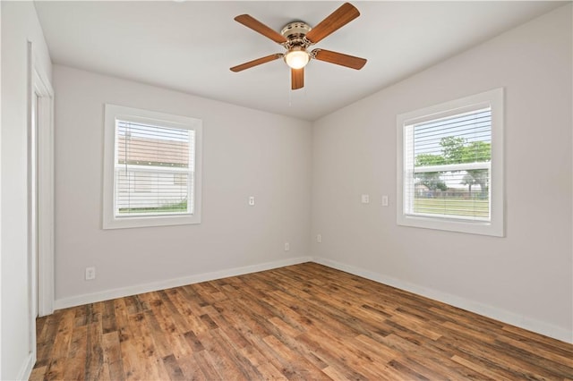 2914 Debra, Corpus Christi, TX 78418 - empty room featuring wood finished floors, ceiling fan, and baseboards